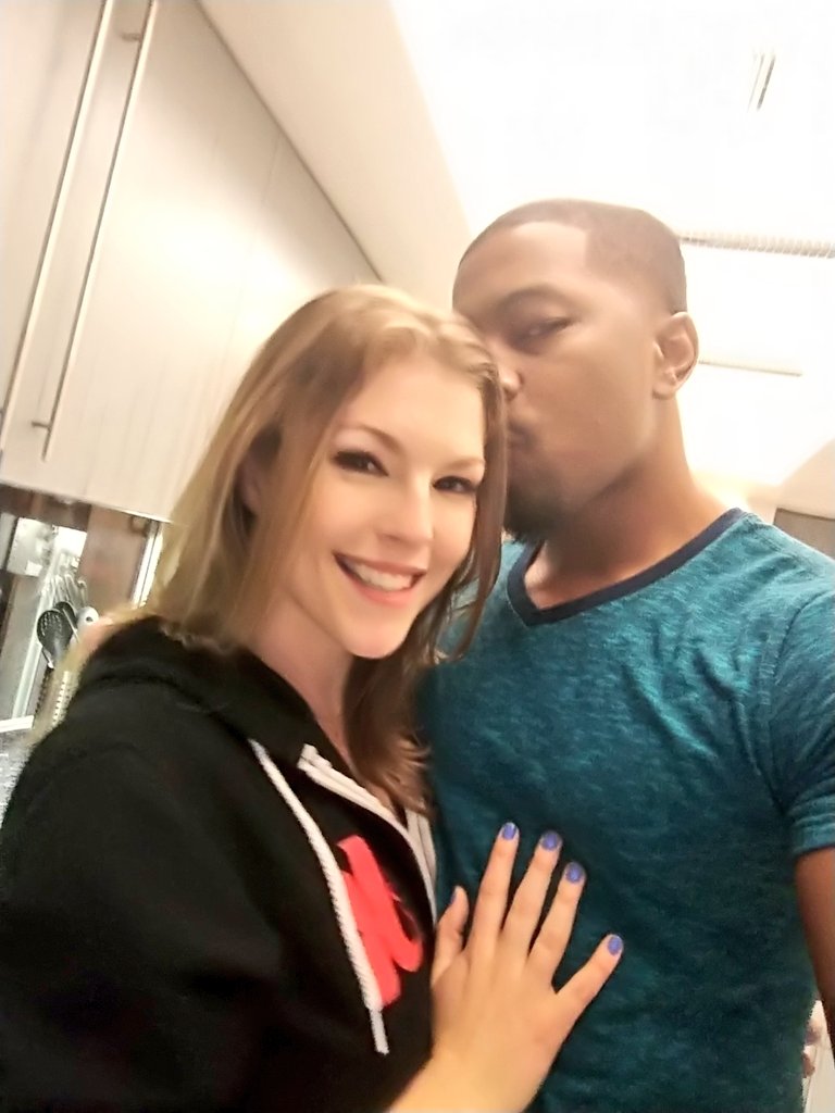 Isiah Maxwell and Ella Nova on set after their shot