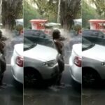 Bold woman strips down and take a cold shower in the street in broad daylight