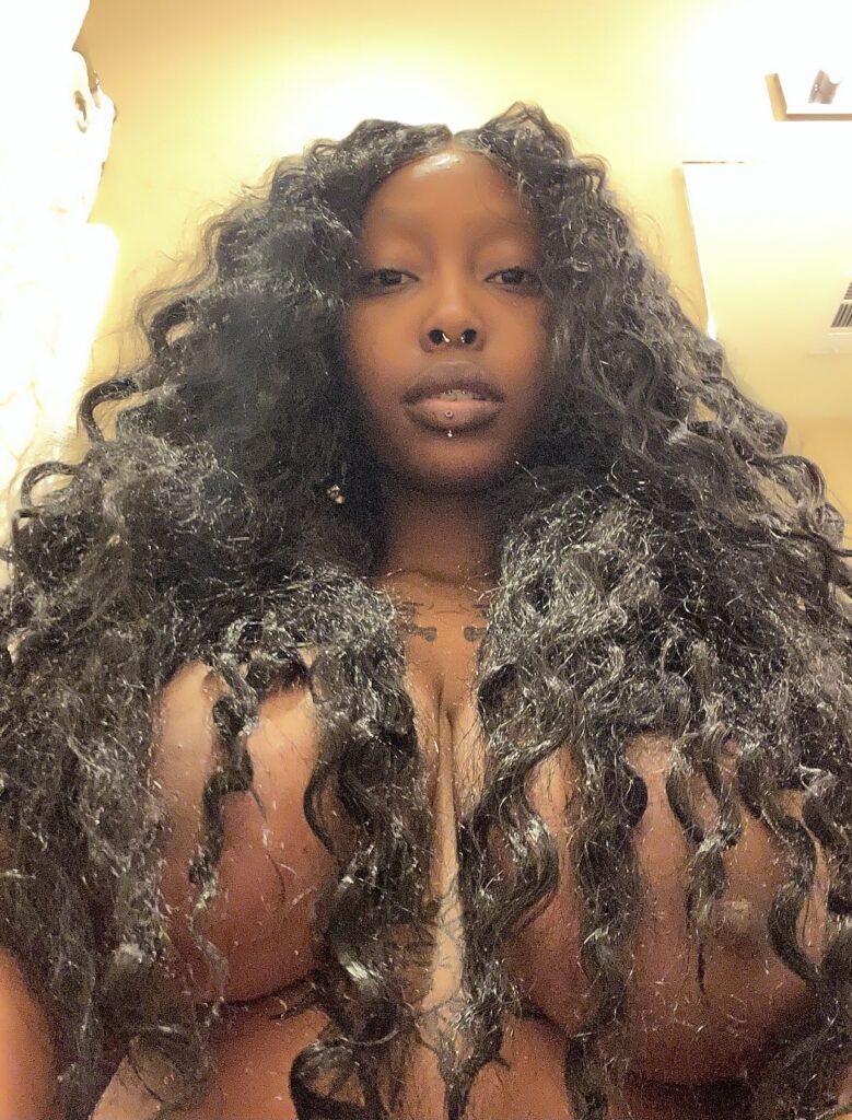 Spicy Maa shows off her boobs piercings
