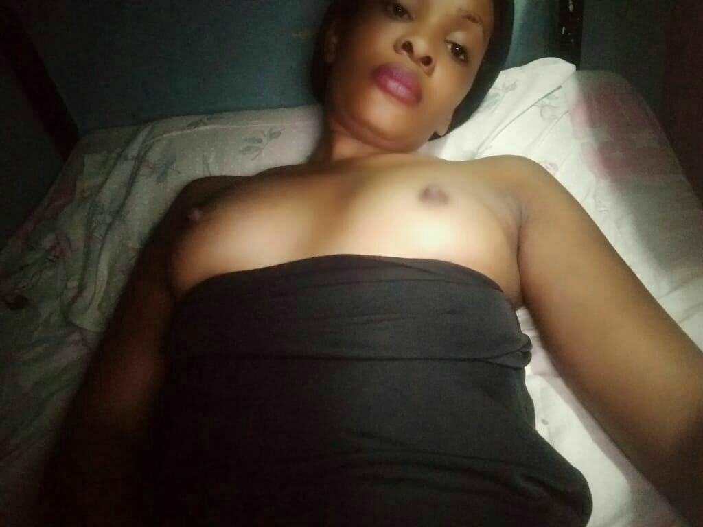 Beautiful lady shows off her pussy and titties for the camera