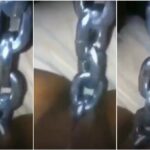 Woman inserts long chains inside of her