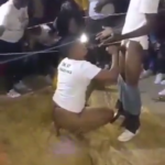 Man’s boxer gets pulled down in front of revelers