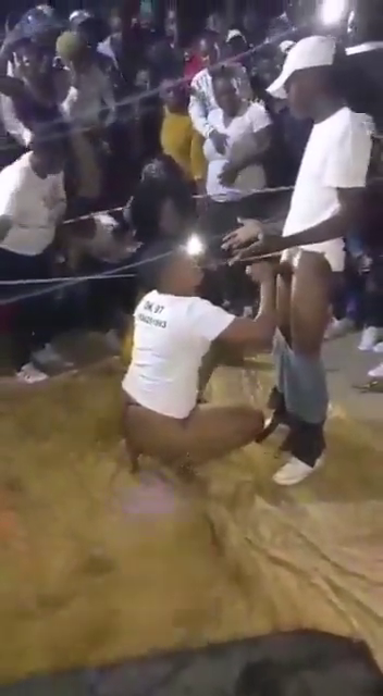 Man’s boxer gets pulled down in front of revelers
