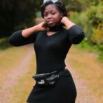 Clara Odendo looks good in clothes and without them