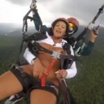 Woman masturbates while on a parachute in the air