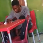 Shameless female student caught on camera giving her man oral sex at university canteen