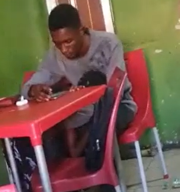 Shameless female student caught on camera giving her man oral sex at university canteen