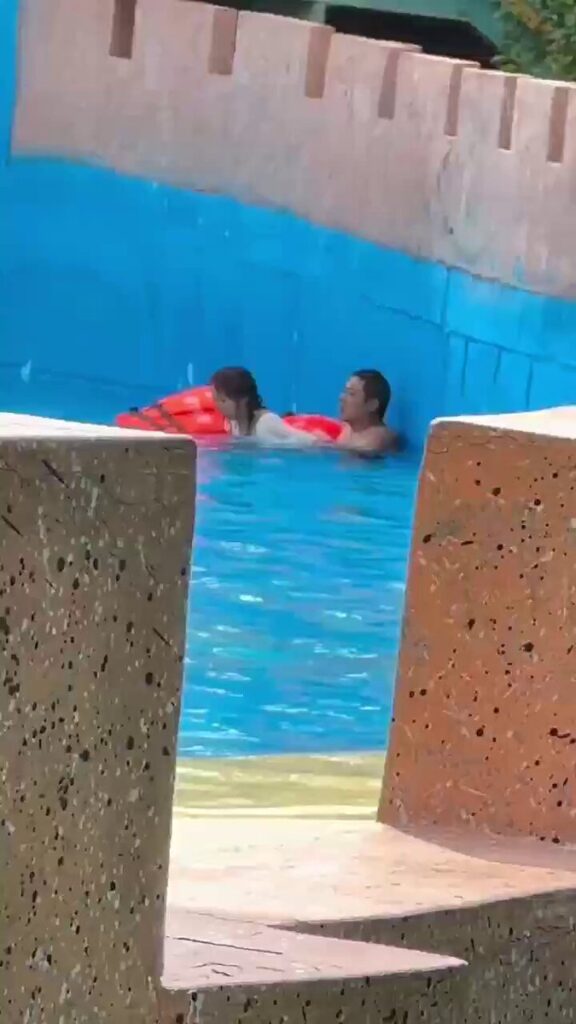 Elderly Chinese man seen having sex with younger woman in a public pool